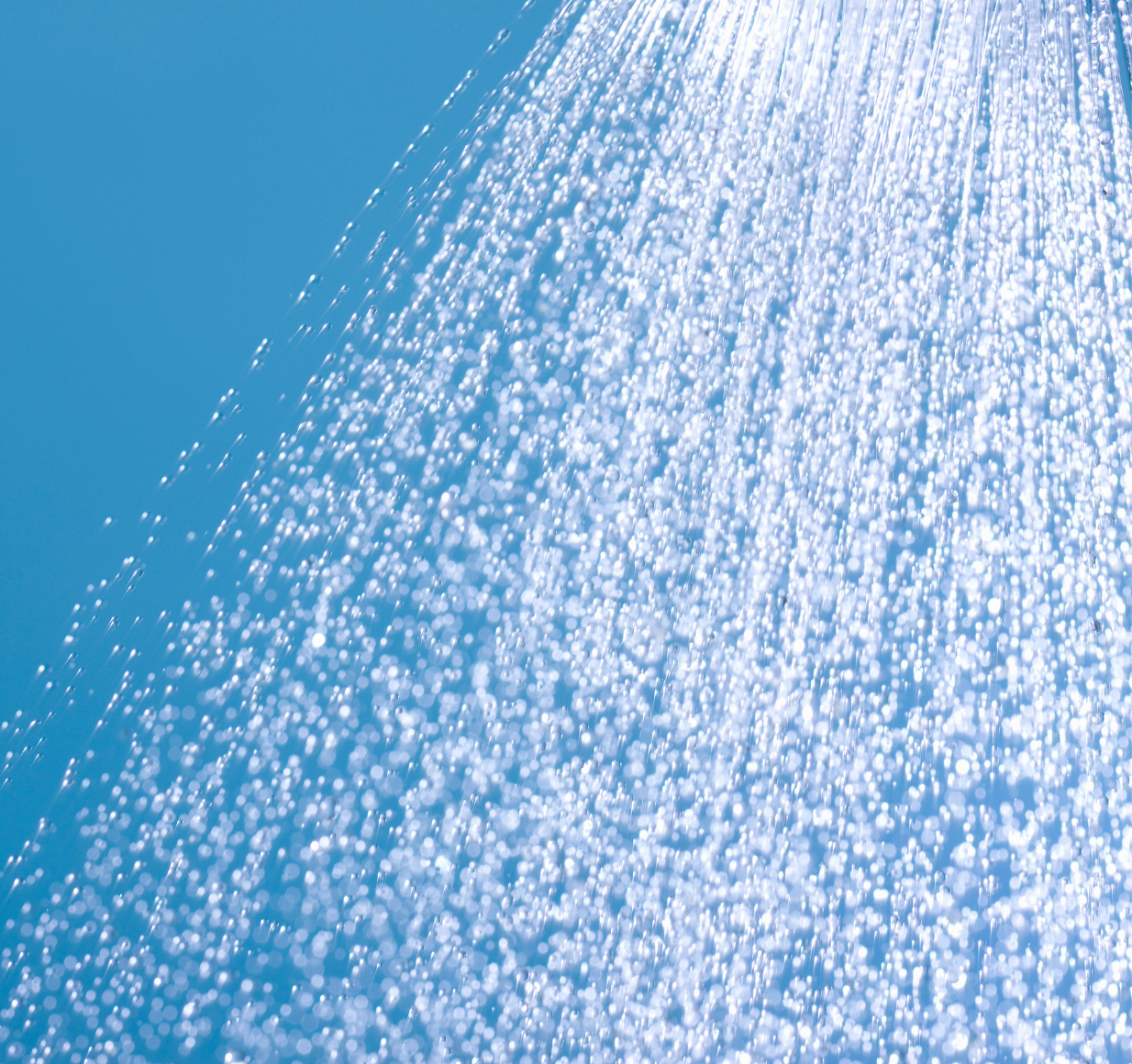 Soft shower spray creating a calming hush